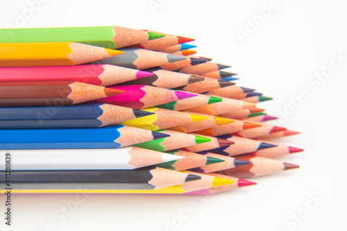 Colored pencils for drawing on a white background. Education and creativity. Leisure and art