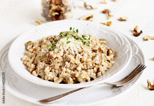 mushroom and barley risotto (Orzotto) , barley porridge with mushrooms. dried porcini mushrooms
