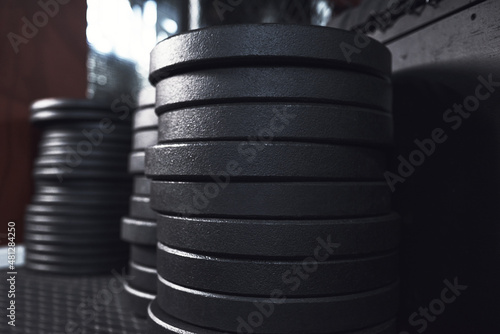 Go heavy or go home. Still life shot of weight plates in a gym.