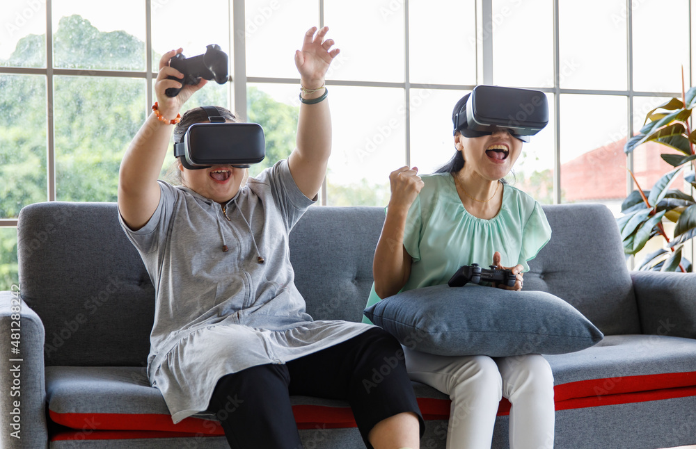 Asian happy lovely mother and young chubby down syndrome autistic