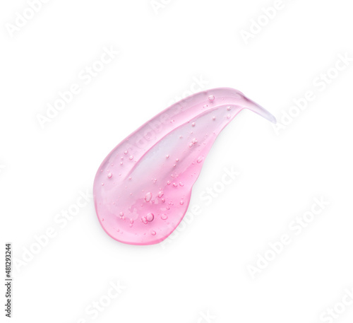 Smear of pink ointment on white background, top view