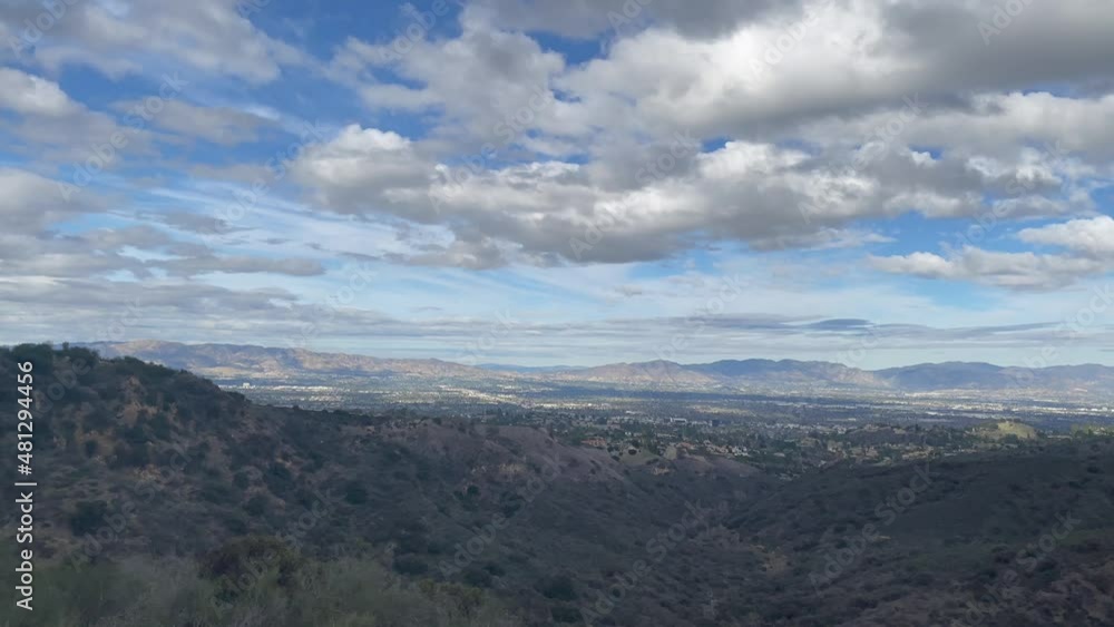 Scenic aerial San Fernando Valley vista viewed from the Mulholland Gateway Park trail on a high visibility afternoon, Los Angeles, California Scenic aerial San Fernando Valley vista viewed from the Mulholland Gateway Park trail on a high visibility afternoon, Los Angeles, California