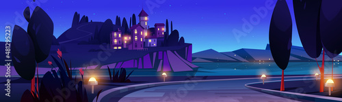 Night Mediterranean landscape, beautiful scenic nature. Sea coast with stone houses, illuminated curve road, mountains, trees and flowers under starry sky. Scenery panorama cartoon vector illustration