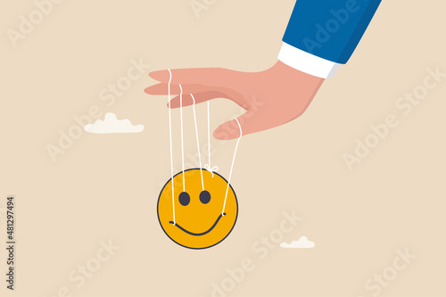 Control emotion or expression, emotional intelligence manage positive way to solve problem and conflict concept, businessman hand tied with string to control, manipulate smile face like puppet doll. photo