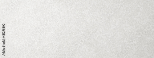 岩肌調の質感のある白い紙の背景テクスチャー