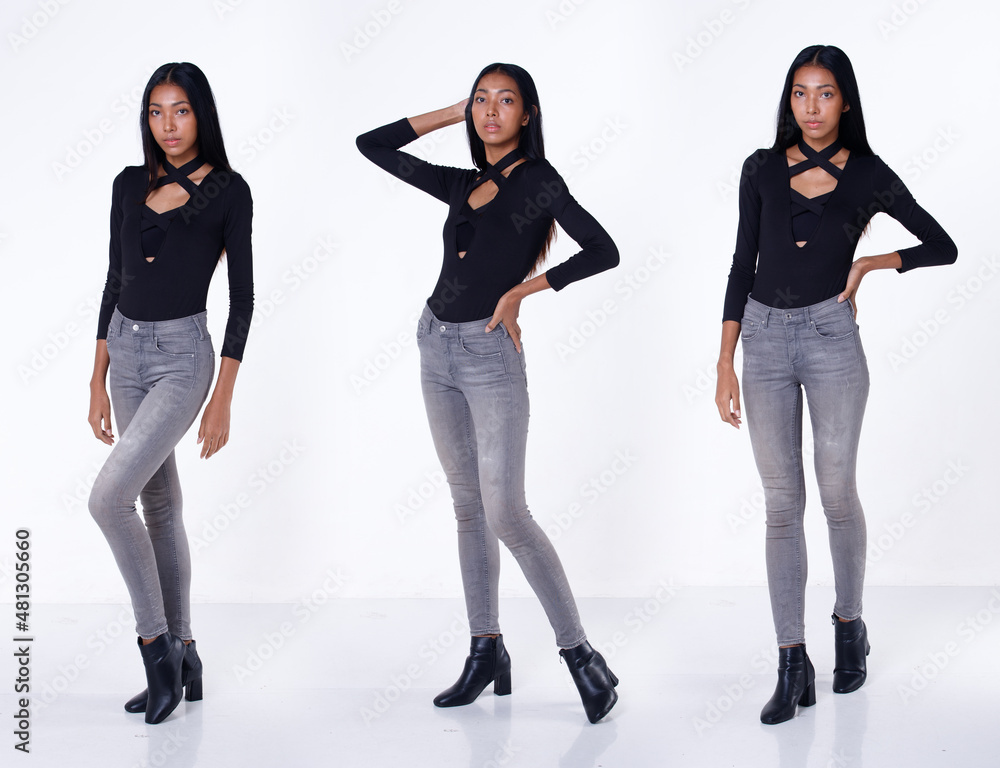 Fototapeta premium Full length body portrait of 20s Asian Woman long black hair vast short pant and shoes. Tanned skin