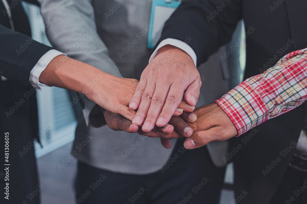 Teamwork Business team joining hands together friendship partners