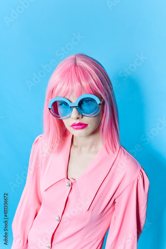 woman in pink wig pink dress Red lips studio model unaltered
