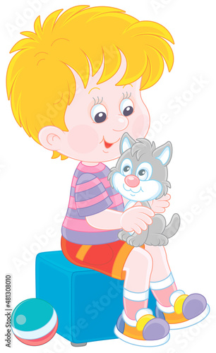 Happy little boy playing with his cute grey and white kitten, vector cartoon illustration isolated on a white background
