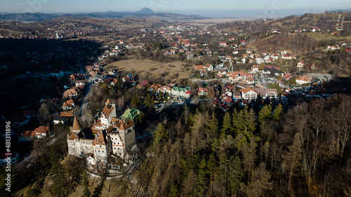 Aerial footage of a Castle in Transylvania on a sunny day photo