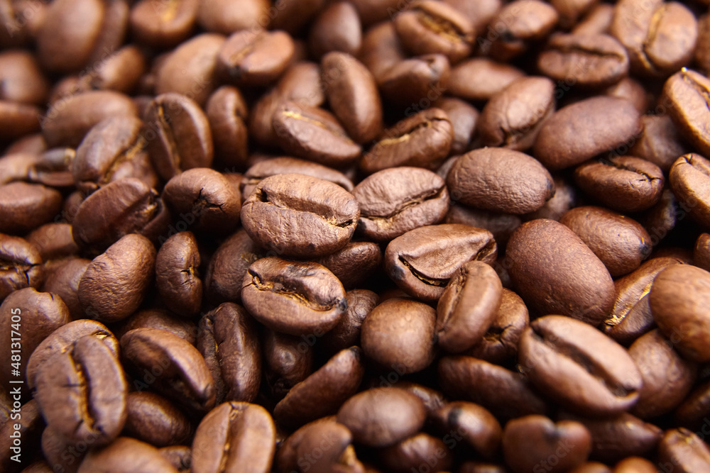 Naklejka premium roasted coffee beans background
