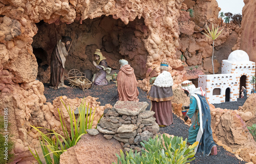 Canvas-taulu Christmas nativity scene in a stable with baby Jesus in a manger, Mary and Josep