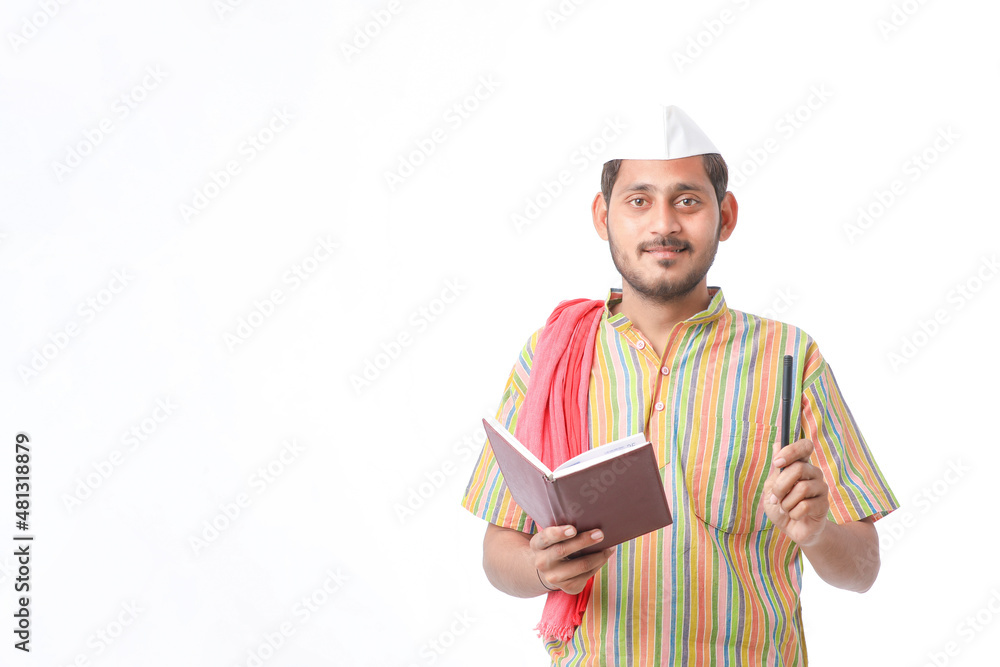 Indian farmer using diary on white background.