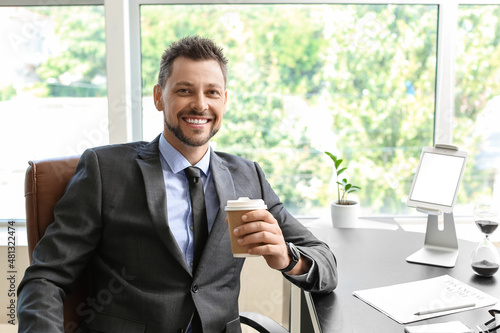 Handsome businessman with c...