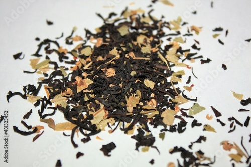 Dry linden leaf tea on a white background close-up