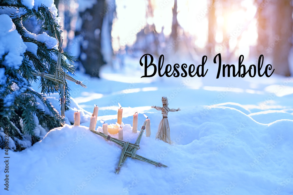 Blessed Imbolc greeting card. Wiccan altar for Imbolc sabbath, pagan  holiday ritual. Brigid's cross of straw, candles, witchcraft doll on snow,  winter forest natural background. Stock Photo | Adobe Stock