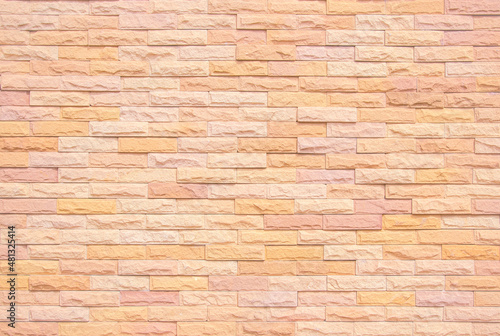 Orange and white brick wall texture background. Brickwork and stonework interior rock pattern old vintage brick wall backdrop