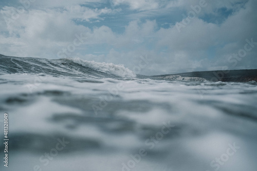 waves crashing on beach, dark, winter waves  © Reuben