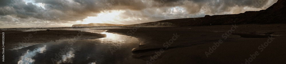 sunset on dark beach sunset on dark beach