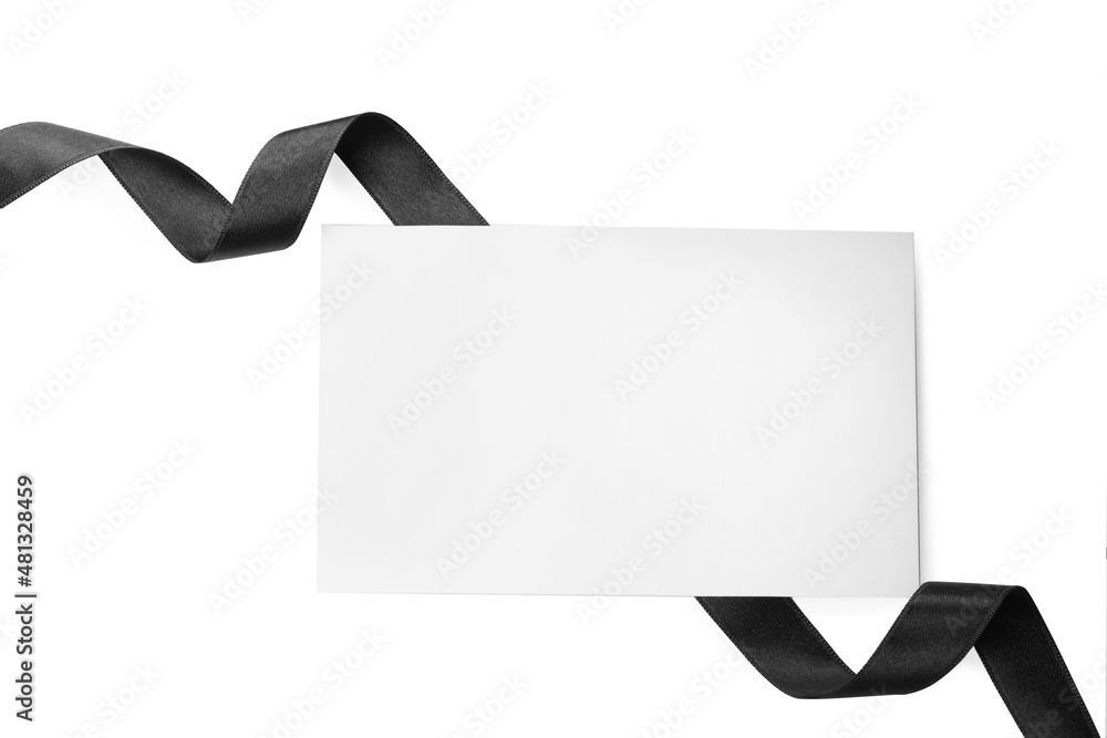 Black satin ribbon and blank card on white background, top view. Space for design Black satin ribbon and blank card on white background, top view. Space for design