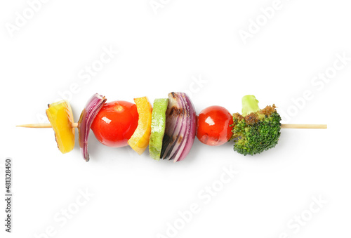 Skewer with vegetables on white background photo