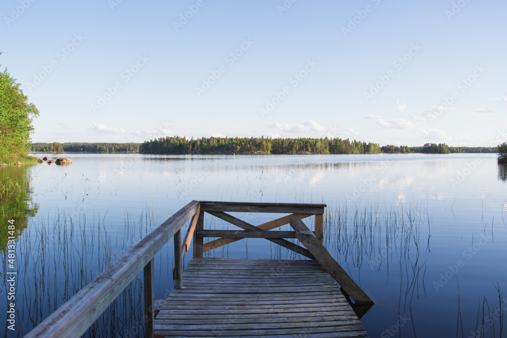 wooden bridge over lake wooden bridge over lake