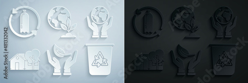 Set Sprout in hand of environmental protection, Human hands holding Earth globe, Eco friendly house, Recycle bin with recycle symbol, plant and Recycling plastic bottle icon. Vector