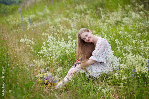 Wallpaper Mural Medieval lady in historical dress. Aroma of spring nature, wild flowers, blue sky, sunshine. Torontodigital.ca