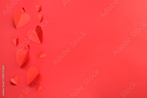 Beautiful paper hearts on red background. St. Valentine s Day