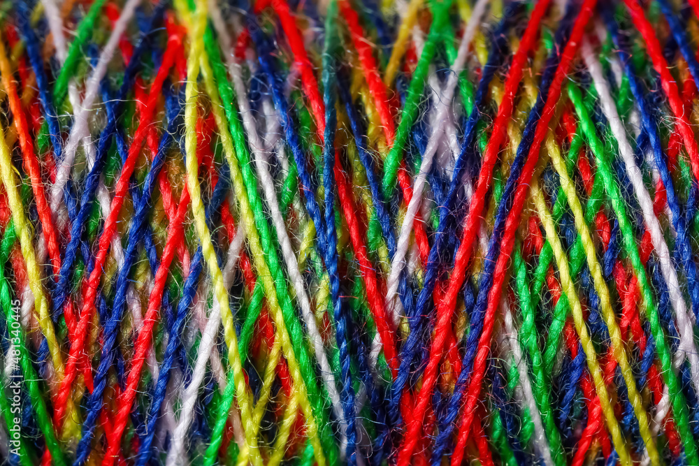 Colorful sewing threads as background