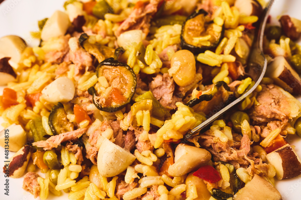 Paella plate with tuna and Brazil nuts. Paella plate with tuna and Brazil nuts.