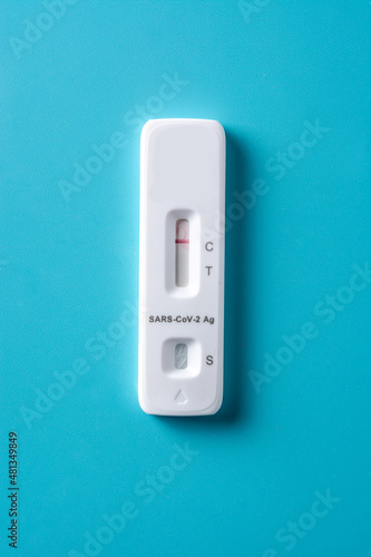 Covid-19 rapid antigen test on blue background 