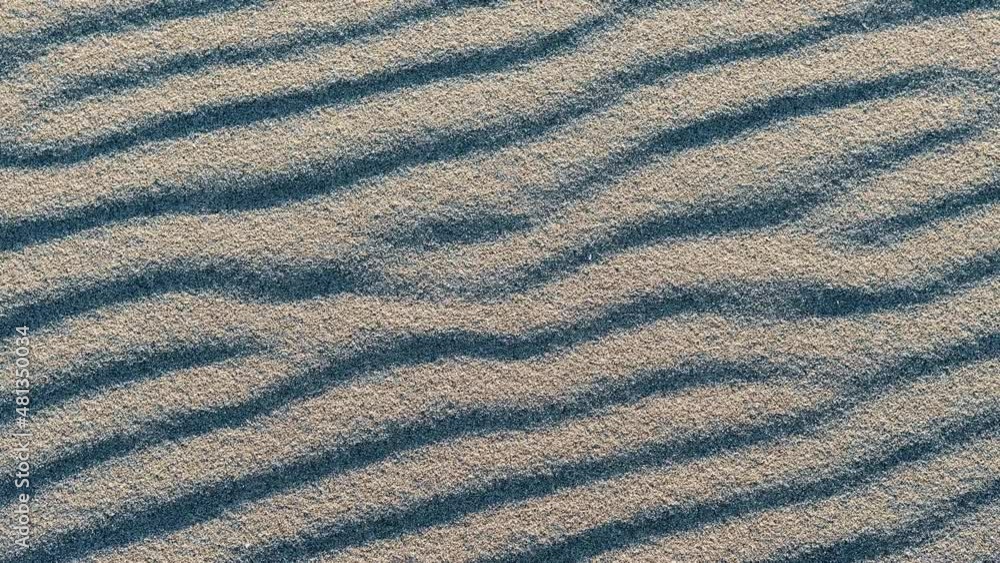 Gusty wind blowing sand over sand dune close-up, slow motion Gusty wind blowing sand over sand dune close-up, slow motion