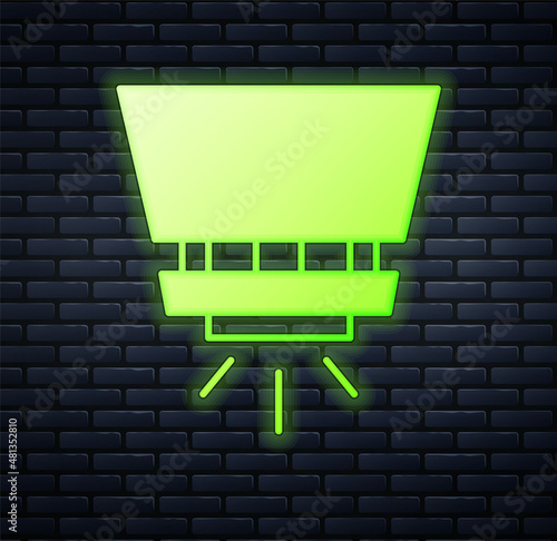 Glowing neon Fire sprinkler system icon isolated on brick wall background. Sprinkler, fire extinguisher solid icon. Vector