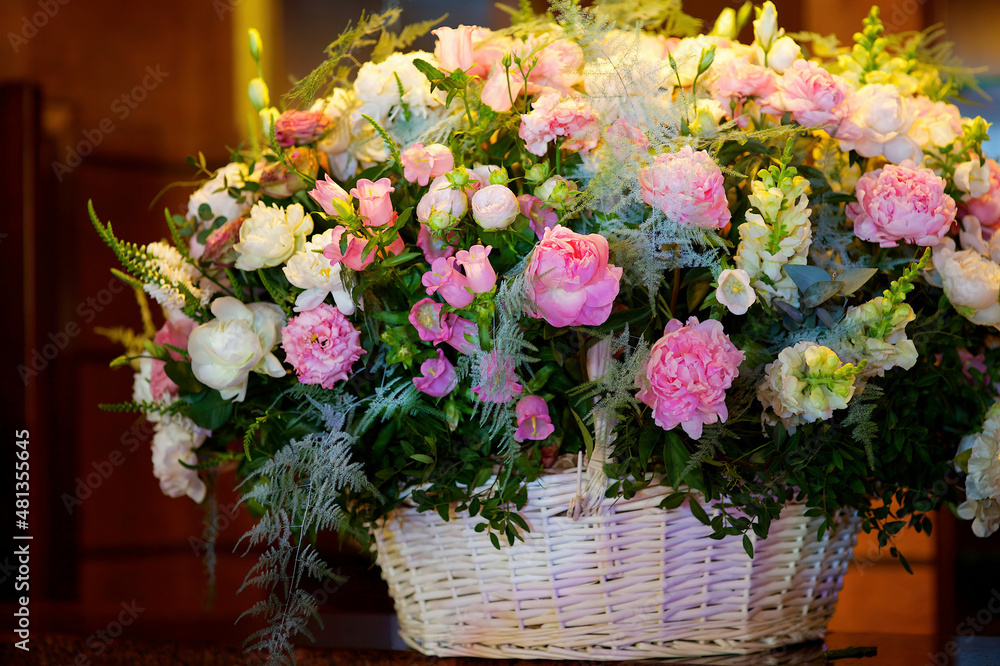 The composition is made by florists from fresh flowers at the party, wedding or celebration.