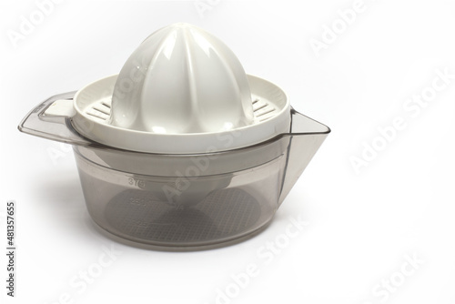 Photos Closeup orange lemon squeezer container white background