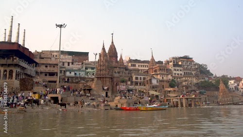Ancient Varanasi city architecture at sunset photo