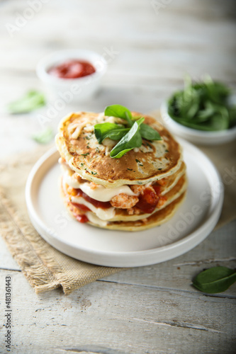 Savory pancakes with chicken and cheese