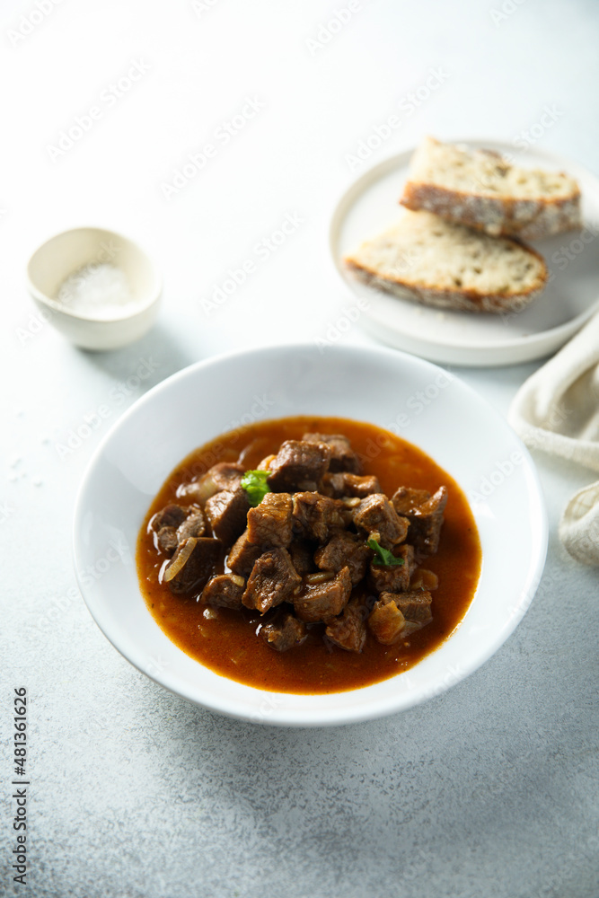 Traditional homemade beef goulash served with bread Traditional homemade beef goulash served with bread