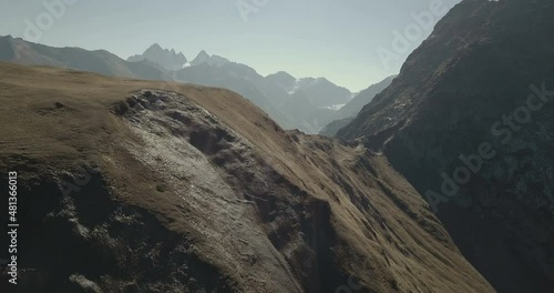 Epic flight over the mountains. lord of the rings atmosphere.