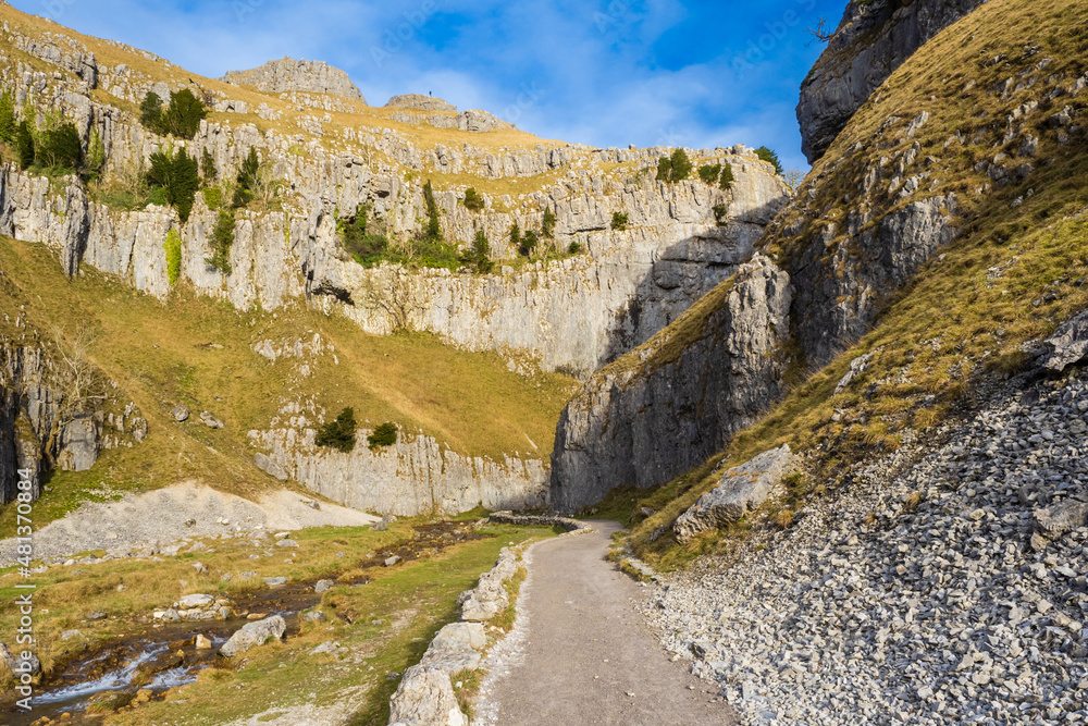 Walkers on their way to Gordale Scar near Malham in the Yorkshire Dales