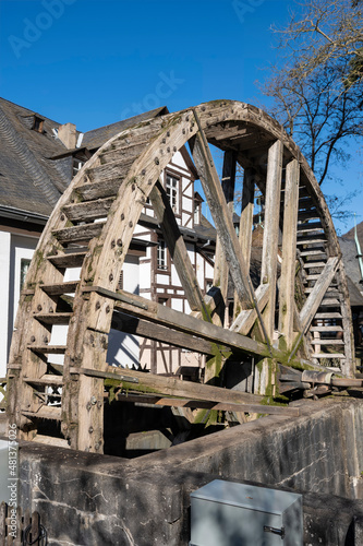 The old historic water wheel in Bad Munster am Stein/Germany in spring 