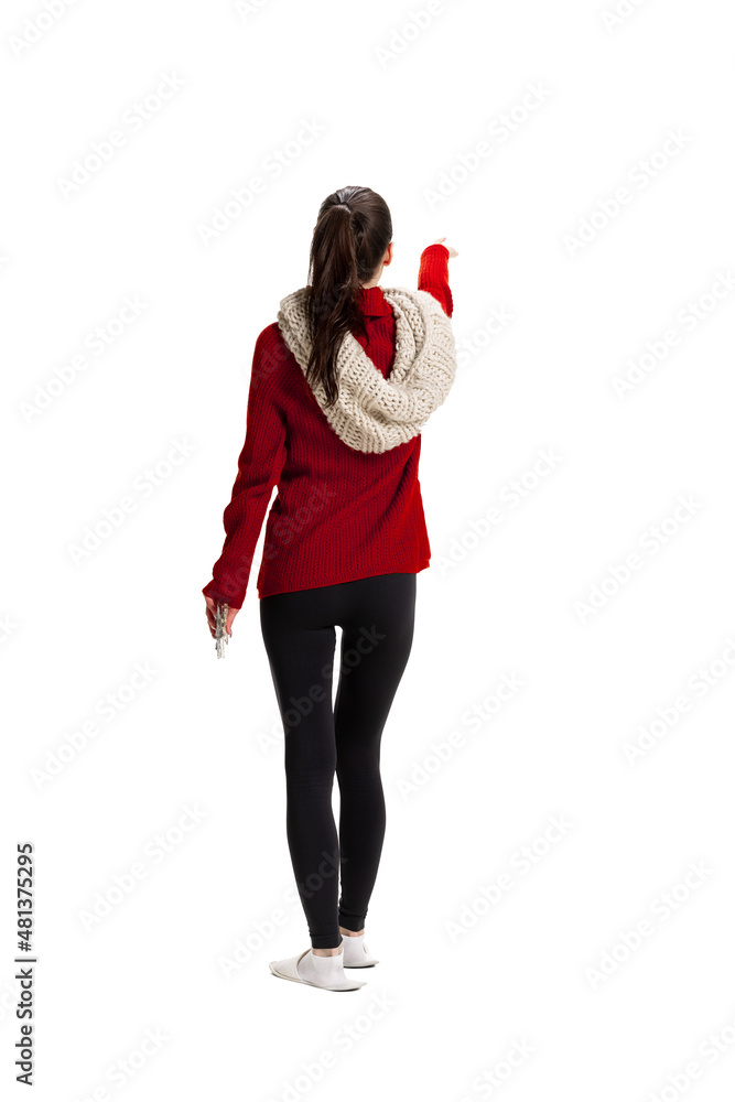 Back view of young girl feeling sick wearing warm home clothes, white slippers isolated over white studio background. Back view of young girl feeling sick wearing warm home clothes, white slippers isolated over white studio background.