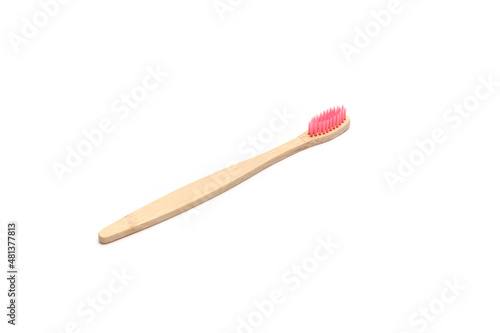 Toothbrush made of bamboo isolated on white background. Plastic free.