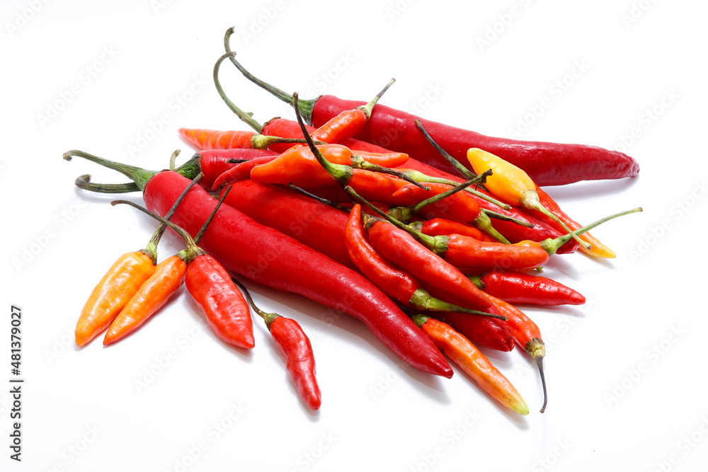 Big red chili and cayenne pepper isolated on white background. Can be used for chili sauce or other cooking spices.Big red chili and cayenne pepper isolated on white background. Can be used for chili Big red chili and cayenne pepper isolated on white background. Can be used for chili sauce or other cooking spices.Big red chili and cayenne pepper isolated on white background. Can be used for chili