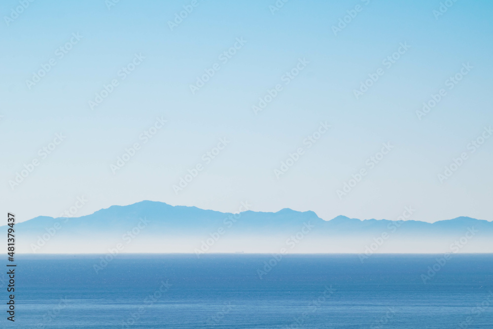 a landdcape image from the southern coast of Spain looking across the Mediterranean Sea at the coast of Africa a landdcape image from the southern coast of Spain looking across the Mediterranean Sea at the coast of Africa