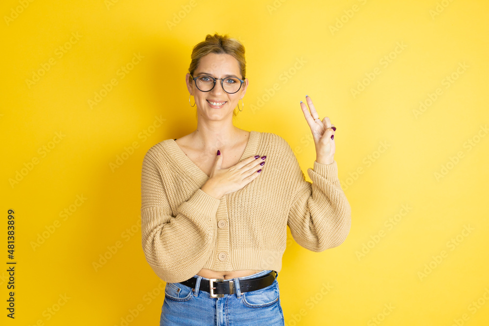 Ταπετσαρία Young beautiful woman wearing casual sweater over isolated yellow background smi