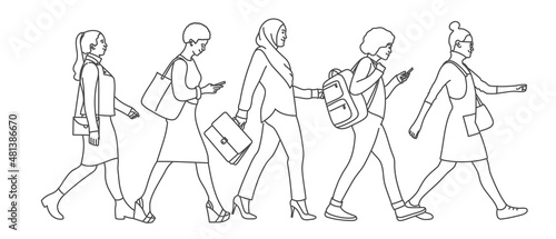 Different people. Crowd of multiethnic women walking through the city.