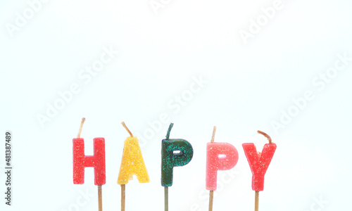 A candle with the word 