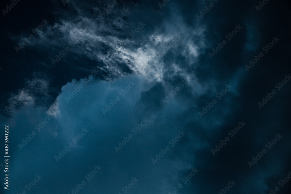 Dramatic Grey Cloudy Sky. Big powerful clouds contrasting with dark sky. Dramatic Grey Cloudy Sky. Big powerful clouds contrasting with dark sky.